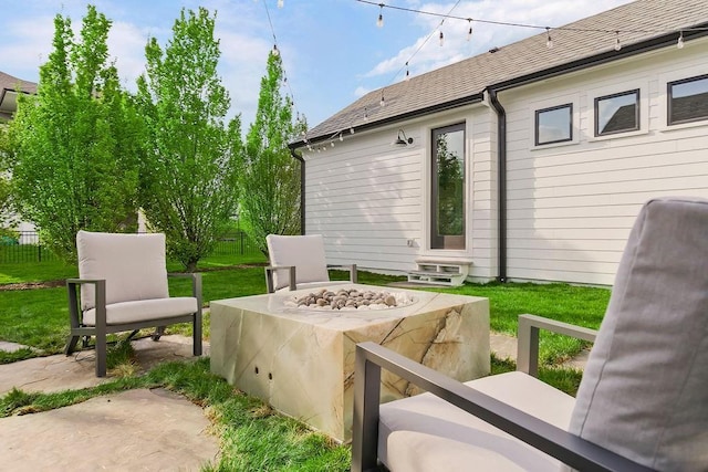 exterior space featuring entry steps and a fire pit