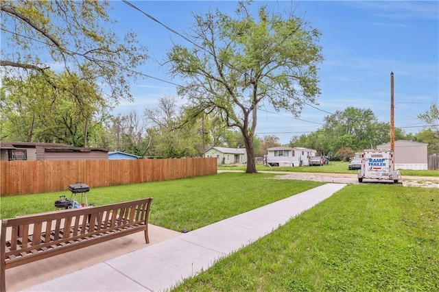 view of yard with fence