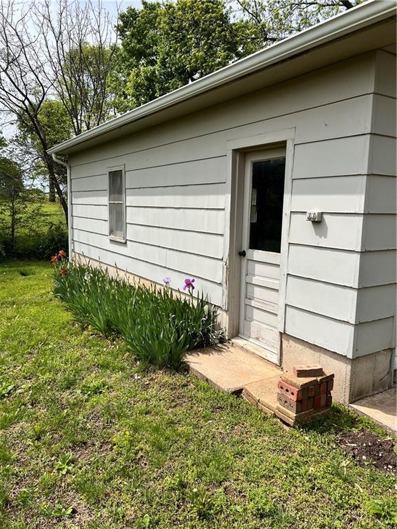 exterior space with a yard