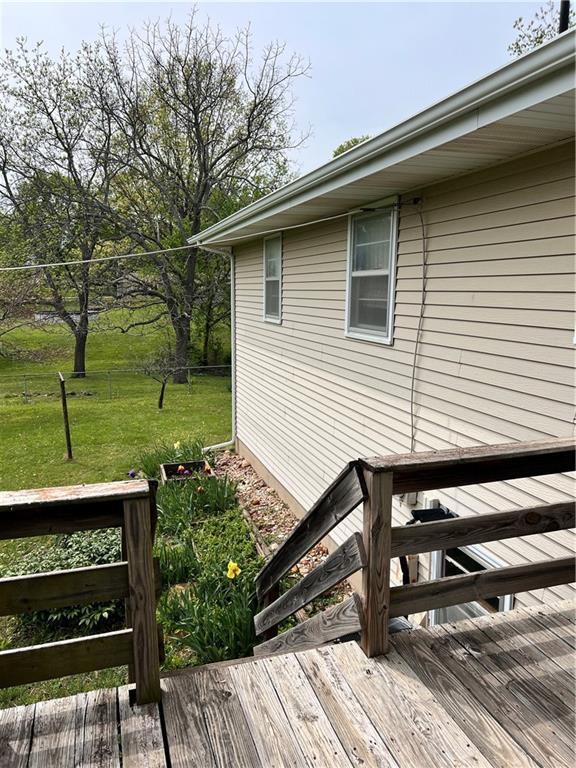 wooden deck with a yard