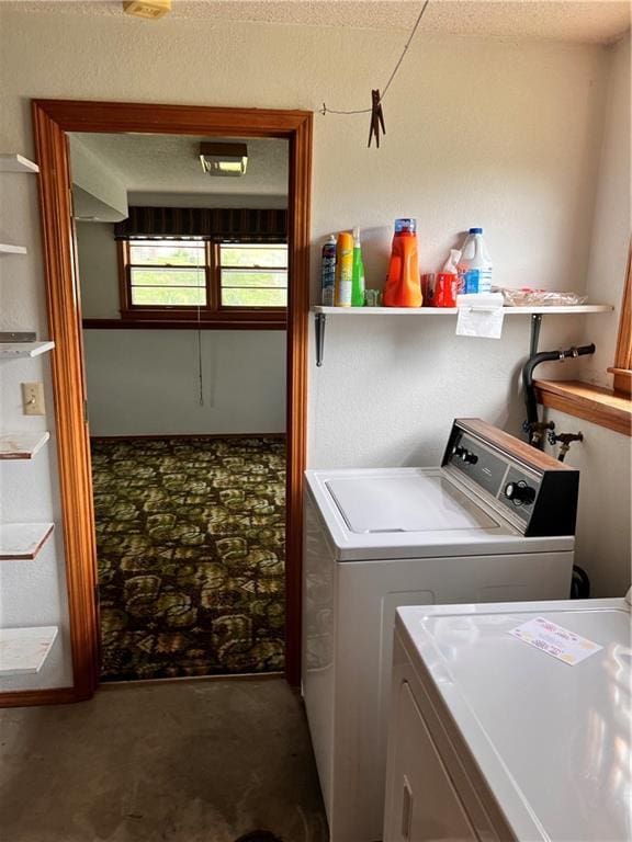 laundry room with laundry area and washer and clothes dryer