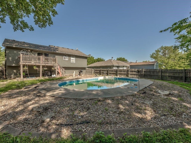 1904 NW Harbor Pl, Blue Springs, MO 64015 - view of swimming pool with stairway, a fenced backyard, a deck, and a patio