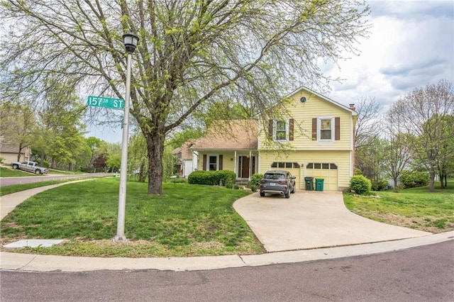 view of front of home featuring a garage, a front lawn, concrete driveway, and a chimney