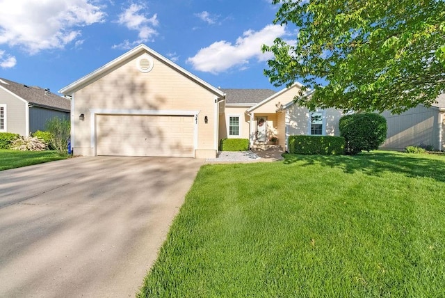 ranch-style house featuring a garage, a front lawn, and concrete driveway
