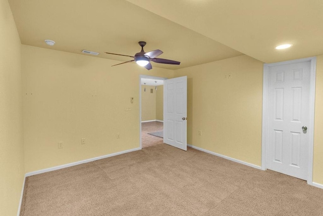 unfurnished room with ceiling fan, visible vents, baseboards, carpet flooring, and recessed lighting