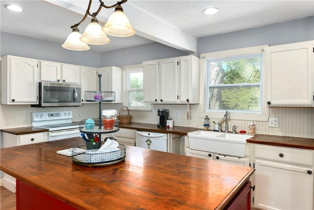 314 N Lake St, Pleasant Hill, MO 64080 - kitchen with a sink, wood counters, white appliances, and white cabinetry
