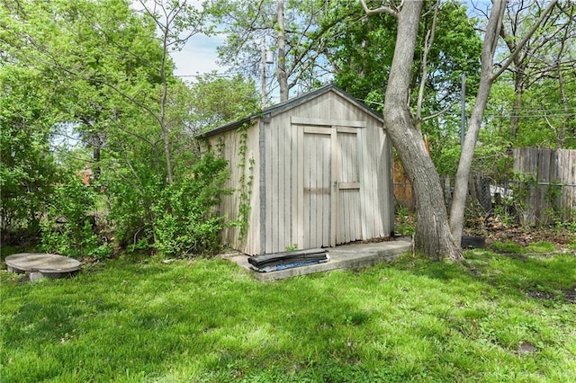314 N Lake St, Pleasant Hill, MO 64080 - view of shed featuring fence