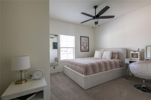 bedroom with carpet flooring, ceiling fan, and baseboards