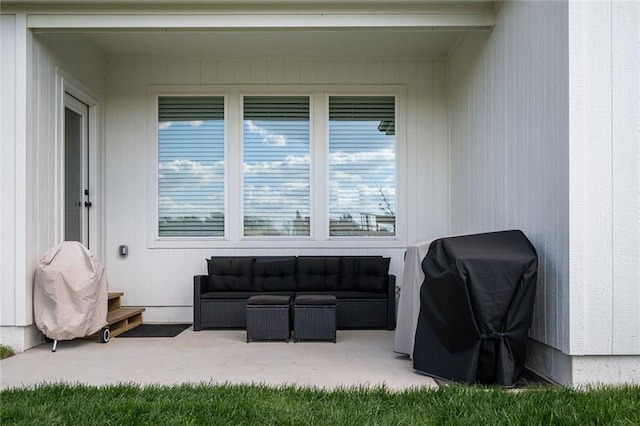 view of patio / terrace with an outdoor hangout area and a grill