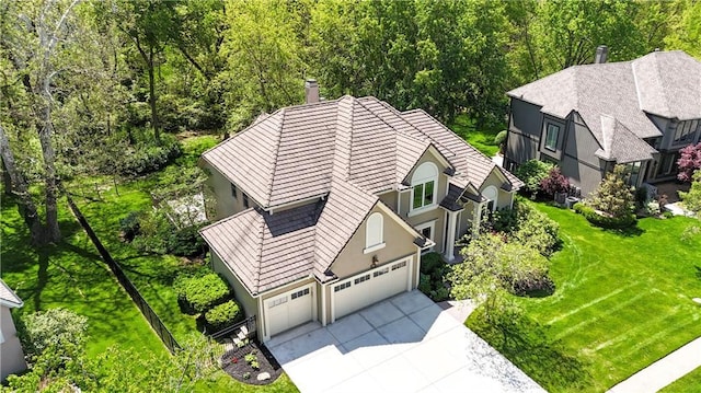 view from above of property featuring a forest