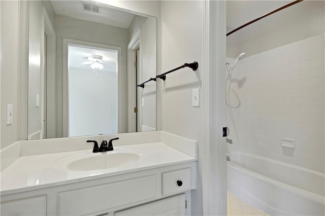 full bath featuring shower / washtub combination, vanity, and a ceiling fan