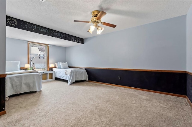 6732 Clairborne Rd, Shawnee, KS 66217 - carpeted bedroom featuring a textured ceiling, ceiling fan, and baseboards