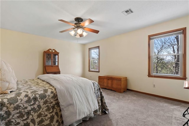 6732 Clairborne Rd, Shawnee, KS 66217 - carpeted bedroom featuring baseboards and ceiling fan