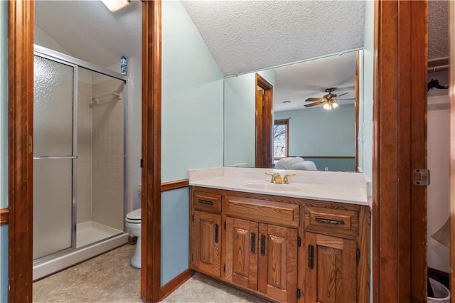 6732 Clairborne Rd, Shawnee, KS 66217 - ensuite bathroom with a stall shower, toilet, vanity, a ceiling fan, and a textured ceiling