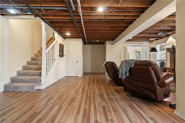 6732 Clairborne Rd, Shawnee, KS 66217 - below grade area featuring wood finished floors and stairway