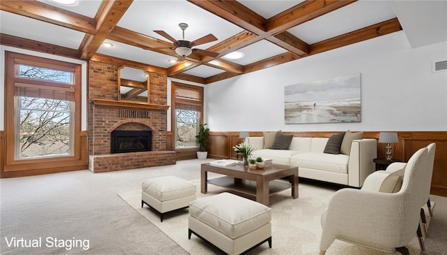6732 Clairborne Rd, Shawnee, KS 66217 - carpeted living room with beamed ceiling, plenty of natural light, a ceiling fan, coffered ceiling, and wainscoting