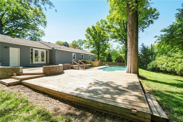9440 Manor Rd, Leawood, KS 66206 - wooden deck with french doors and a yard