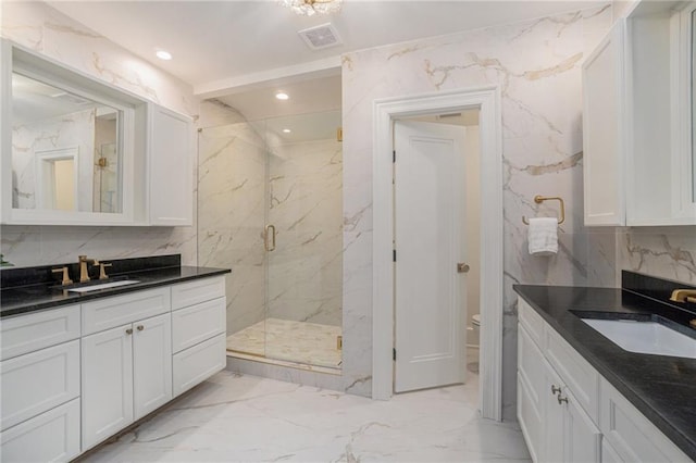 9440 Manor Rd, Leawood, KS 66206 - full bath with marble tiled flooring, a marble finish shower, decorative backsplash, two vanities, and recessed lighting