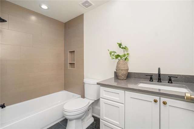 9440 Manor Rd, Leawood, KS 66206 - bathroom featuring toilet, vanity, tub / shower combination, and recessed lighting