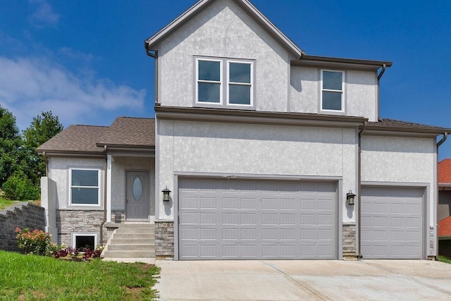 view of front of home featuring a garage, stucco siding, driveway, and stone siding
