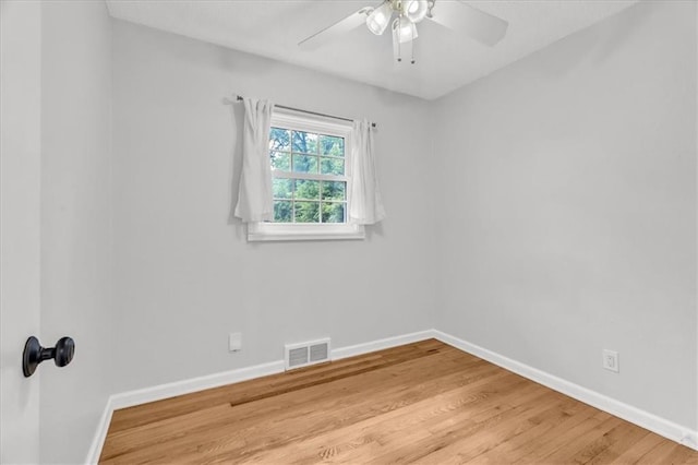 7934 Maple St, Prairie Village, KS 66208 - unfurnished room with baseboards, light wood-type flooring, and ceiling fan