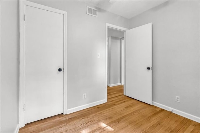 7934 Maple St, Prairie Village, KS 66208 - unfurnished bedroom featuring light wood finished floors and baseboards