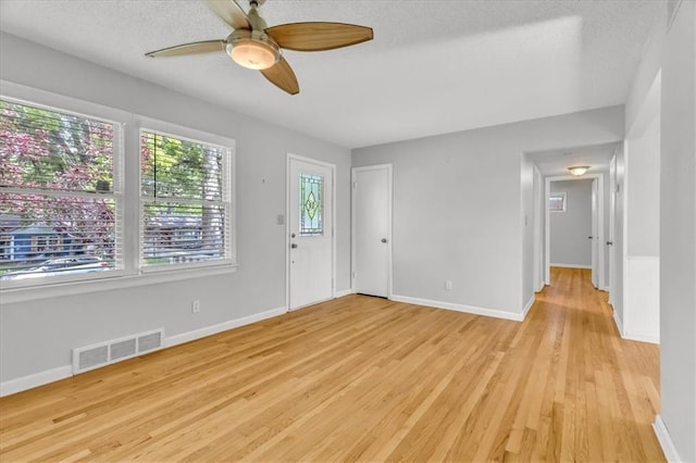 7934 Maple St, Prairie Village, KS 66208 - foyer featuring ceiling fan, light wood-type flooring, and baseboards