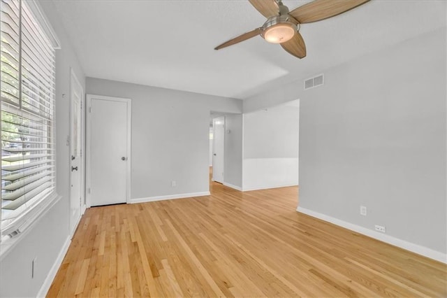 7934 Maple St, Prairie Village, KS 66208 - spare room with light wood-type flooring, ceiling fan, and baseboards