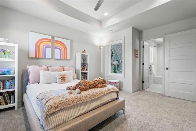 carpeted bedroom with recessed lighting, baseboards, a ceiling fan, ensuite bathroom, and visible vents