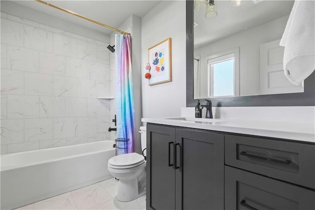 full bathroom featuring toilet, shower / tub combo, marble finish floor, and vanity