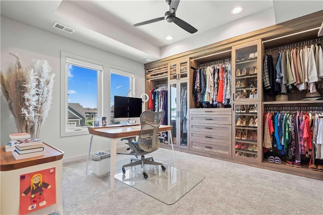 carpeted office space featuring visible vents, a ceiling fan, baseboards, and recessed lighting