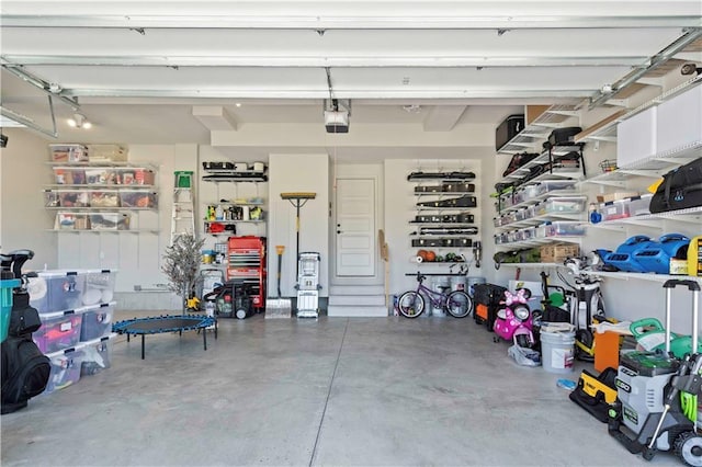 garage featuring a garage door opener