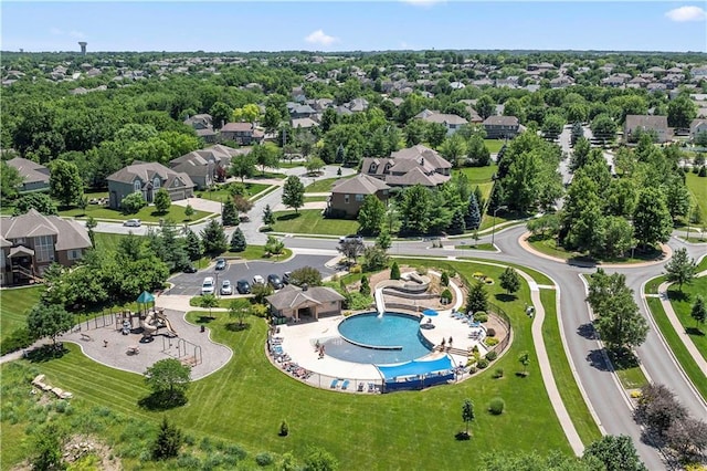 birds eye view of property with a residential view