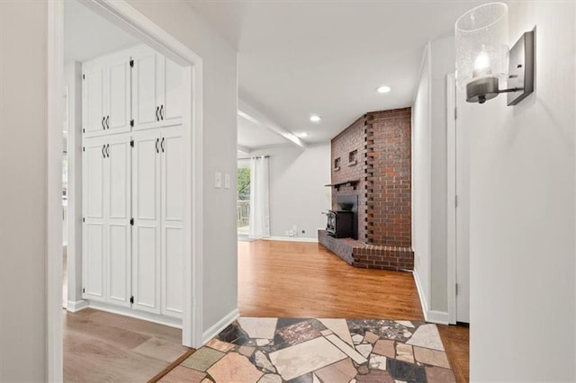 10401 Cypress Dr, Kansas City, MO 64137 - corridor featuring light wood-style floors, recessed lighting, and baseboards