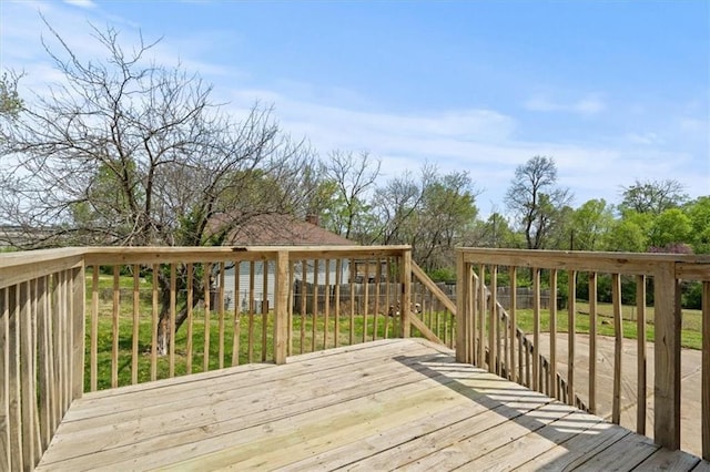 10401 Cypress Dr, Kansas City, MO 64137 - view of wooden deck