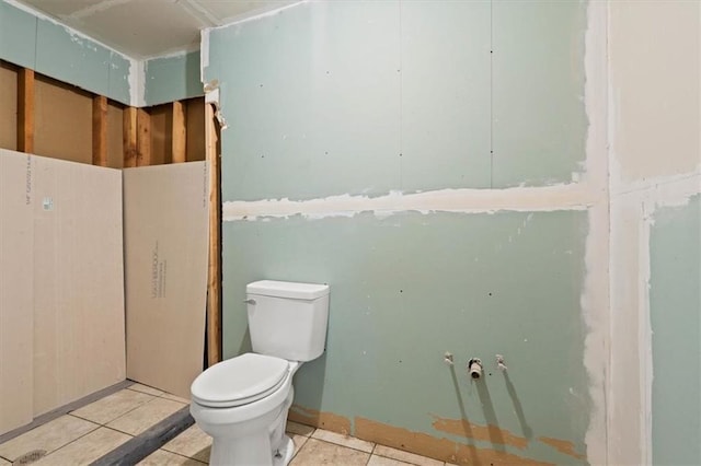 10401 Cypress Dr, Kansas City, MO 64137 - bathroom with tile patterned floors and toilet