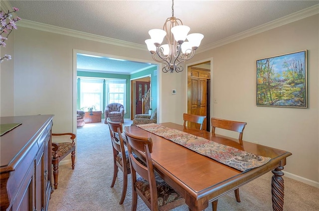 14241 W 113th Ter, Olathe, KS 66062 - dining room with light carpet, ornamental molding, and a chandelier
