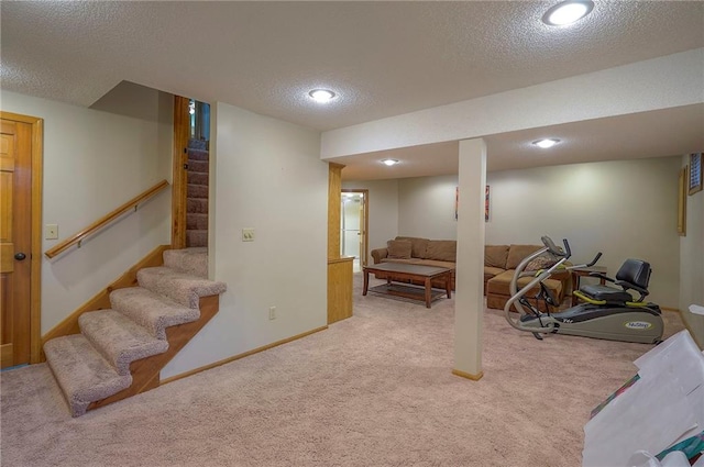 14241 W 113th Ter, Olathe, KS 66062 - workout area featuring a textured ceiling, carpet floors, recessed lighting, and baseboards