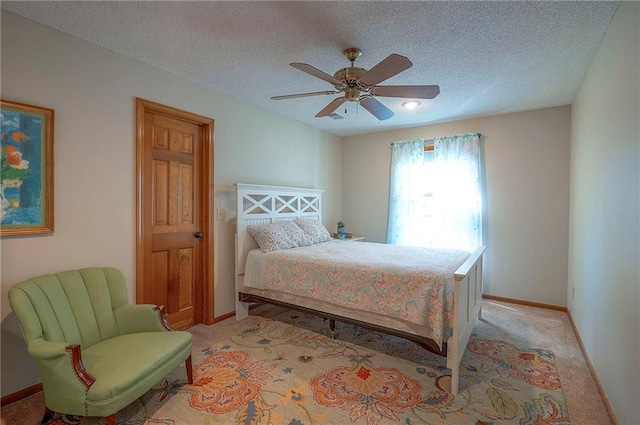 14241 W 113th Ter, Olathe, KS 66062 - bedroom featuring light colored carpet, ceiling fan, a textured ceiling, and baseboards