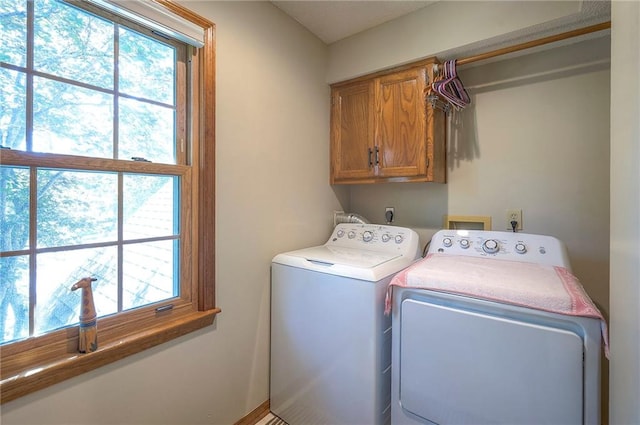 14241 W 113th Ter, Olathe, KS 66062 - laundry room with cabinet space and separate washer and dryer