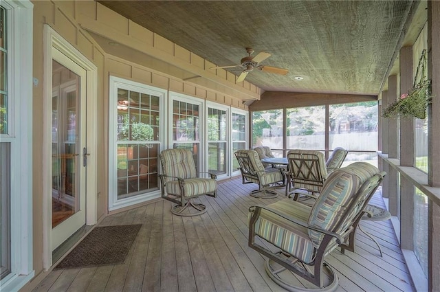 14241 W 113th Ter, Olathe, KS 66062 - sunroom / solarium with lofted ceiling, ceiling fan, and outdoor dining space
