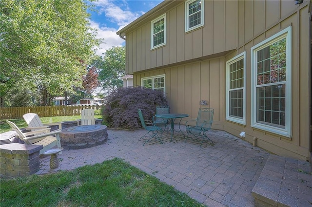 14241 W 113th Ter, Olathe, KS 66062 - view of patio / terrace with an outdoor fire pit