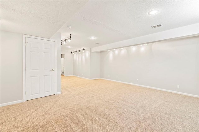 21710 W 61st St, Shawnee, KS 66218 - spare room with light colored carpet and a textured ceiling