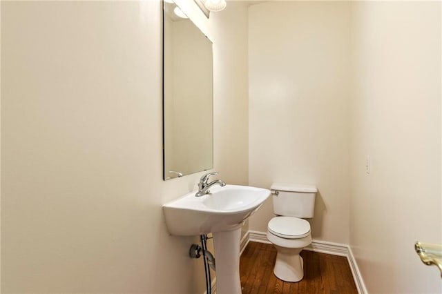 21710 W 61st St, Shawnee, KS 66218 - half bathroom with toilet and wood finished floors