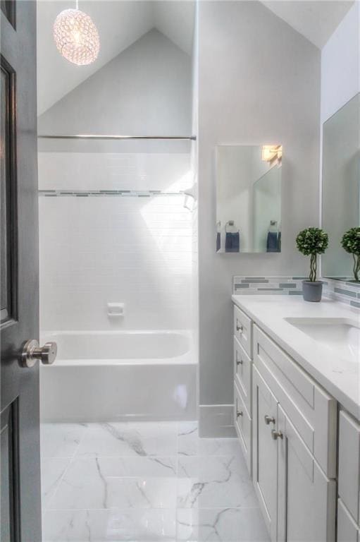 4016 W 79th St, Prairie Village, KS 66208 - full bath with marble finish floor, bathtub / shower combination, lofted ceiling, and vanity