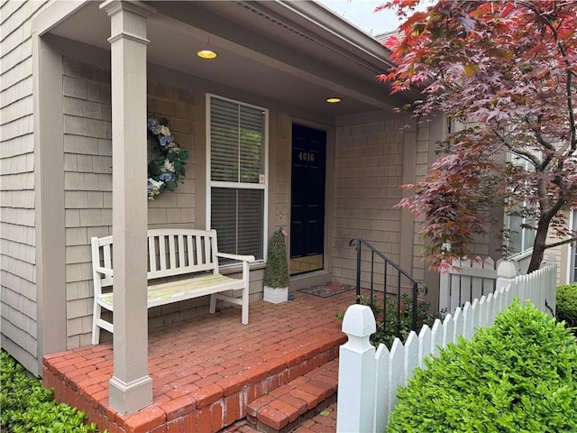 4016 W 79th St, Prairie Village, KS 66208 - property entrance featuring a porch and fence