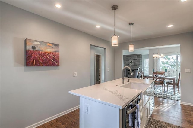 4016 W 79th St, Prairie Village, KS 66208 - kitchen with dark wood-style flooring, baseboards, recessed lighting, and a sink