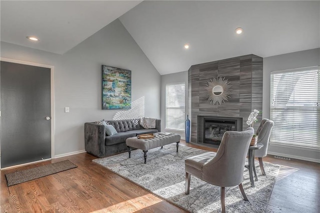 4016 W 79th St, Prairie Village, KS 66208 - living area featuring baseboards, recessed lighting, wood finished floors, and a large fireplace