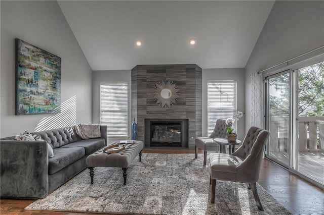 4016 W 79th St, Prairie Village, KS 66208 - living room with a fireplace, high vaulted ceiling, and dark wood-type flooring