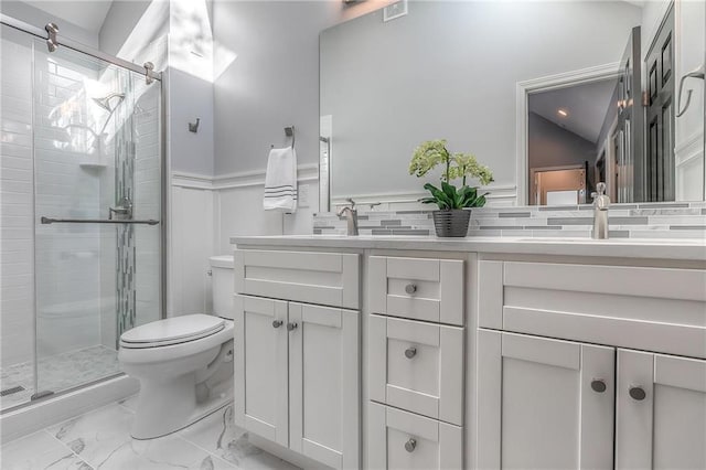 4016 W 79th St, Prairie Village, KS 66208 - full bath featuring double vanity, marble finish floor, toilet, a sink, and a stall shower